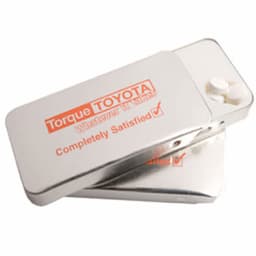 A silver Slider Tin with white tablets inside and a logo. It features a sleek, rectangular design.