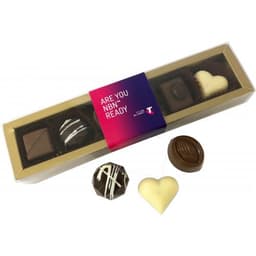 An assortment of praline chocolates in a decorative box, featuring dark, milk, and white chocolate varieties.