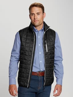 A black puffy vest with a high collar, worn over a blue checkered shirt, featuring a zippered pocket and grey accents.