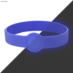 A navy blue silicone wristband with a circular design element and a prominent logo area.
