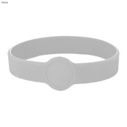 A white silicone wristband featuring a circular design element and a logo.
