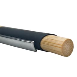 A French bamboo pen featuring a natural bamboo barrel and a sleek chrome clip, with a black grip section.