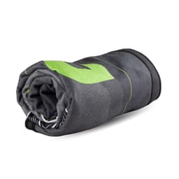 A rolled-up beach towel in grey with green accents, featuring a subtle patterned design and a logo.