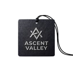 A car air freshener in a square design, featuring a black background and a logo in a silver finish.
