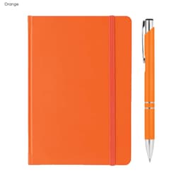 An orange A5 notebook with an elastic band and a matching pen set beside it. The notebook has a logo on the cover.