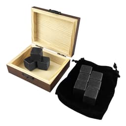 A wooden box containing grey stone whiskey ice cubes, with a black velvet pouch beside it holding additional cubes.
