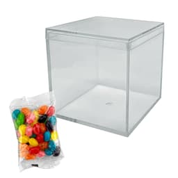 A clear cube container beside a pack of colourful jelly beans, featuring various bright hues and shapes.
