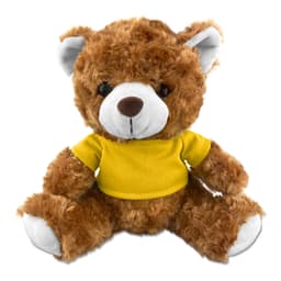 A plush teddy bear in brown fur, wearing a yellow shirt, sitting with its arms and legs outstretched.