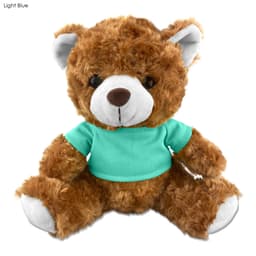 A plush teddy bear in light brown, wearing a turquoise shirt, featuring soft fur and distinct facial details.