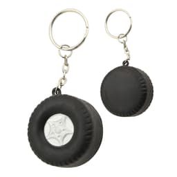 A black tyre-shaped key ring with a silver centre, featuring a metal chain and keyring attachment.