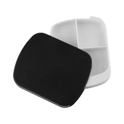 A black spin pill box with a white interior, featuring compartments for organising medication. It has a logo on the exterior.