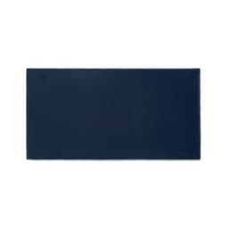 A rectangular mat in navy blue, featuring a textured surface and clean edges, with a branding logo.