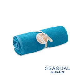 A rolled turquoise towel secured with a tag, featuring a logo at the bottom.