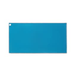 A large rectangular product in a vibrant turquoise colour with a textured surface and a white label in one corner.