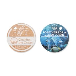 Two circular tags featuring ocean-themed designs. One promotes "Cleaning the Ocean," while the other reads "Together for a Clean Ocean."