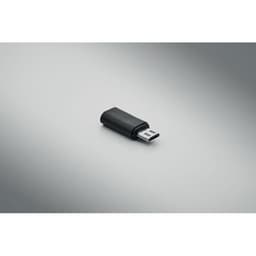 A USB drive in a black casing, featuring a small removable connector. The background is a smooth, grey gradient.