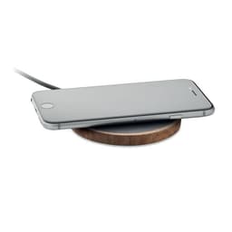A wireless charging pad with a wooden base and a smartphone placed on top, connected to a cable.