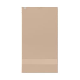 A tan yoga mat with a textured surface and a smooth bottom strip, showcasing a simple design.