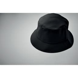 A black bucket hat on a grey background. The hat has a simple design and a soft texture.