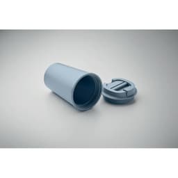 A light blue drink bottle with a threaded lid, partially open, resting on a neutral background.