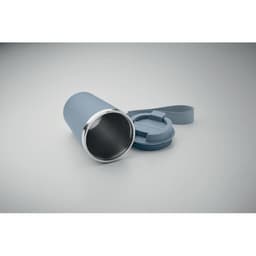 A drink bottle in light blue with a stainless steel interior and a detachable lid. It features a carrying strap.