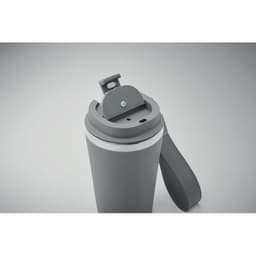 A drink bottle in grey with a flip top lid and a carrying strap, featuring a logo on the side.