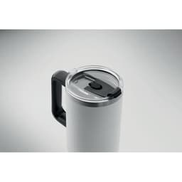 A drink bottle in white with a black handle and a clear lid featuring a sliding closure.