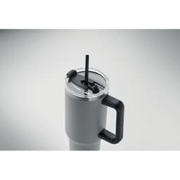 A drink bottle in grey with a black handle, featuring a transparent lid and a straw, includes branding.