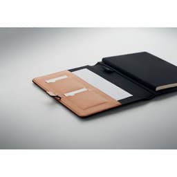 A black notebook with a tan organisational sleeve, featuring card slots and a pocket. It has a minimalist design.