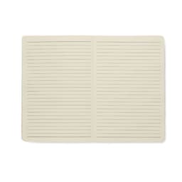 A blank, cream-coloured notebook with lined pages, laid open to display both pages. It features no branding.