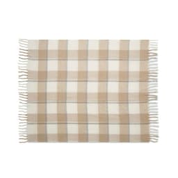 A patterned blanket featuring a beige and cream plaid design with fringed edges.