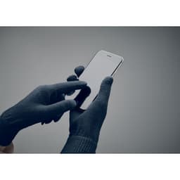 A pair of navy blue gloves is shown, with a hand touching the screen of a smartphone.
