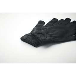 A pair of black gloves stacked neatly, featuring a ribbed cuff design. The gloves are made from a soft material.