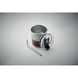 A drink bottle with a silver top, wooden band, clear lid, and a stainless steel straw alongside it.