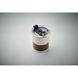 A drink bottle in cream and brown with a transparent lid and a dark straw, featuring a logo.