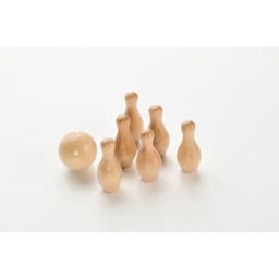 A set of wooden skittles and a ball, featuring natural wood colour, arranged on a white background.