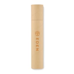 A cylindrical packaging tube in natural kraft paper with a circular logo and the word "EDEN" printed on it.