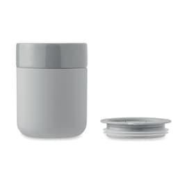A drink bottle in light grey with a separate, matching lid beside it. The bottle has a smooth, matte finish.