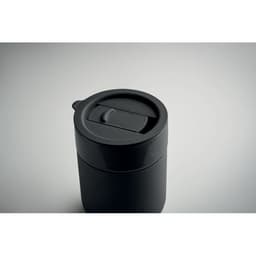 A drink bottle in black with a flip-top lid and a sleek design, featuring a logo on the side.