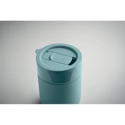 A drink bottle in a soft blue colour with a screw-on lid and a sliding opening mechanism. It features a logo.