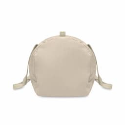 A bag in a neutral beige colour with two adjustable straps and a rounded shape. It has a simple design with no visible branding.