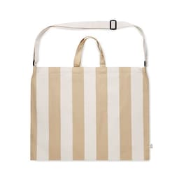 A striped tote bag in beige and cream with a detachable shoulder strap and dual handles. Features a branded emblem.