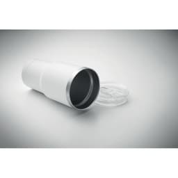 A drink bottle in white with a silver rim, lying on its side with a clear lid resting nearby.