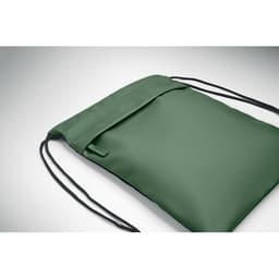 A green drawstring bag with a smooth finish and black cords for closure, featuring a branding logo.