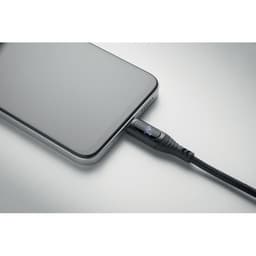 A black charging cable connected to a smartphone, showcasing a sleek design and modern aesthetics.