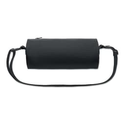 A cylindrical black bag with a shoulder strap and zippered closure. It has a minimalist design.