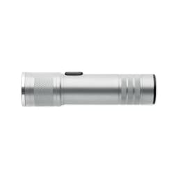 A silver flashlight with a textured grip and a black lens, featuring a side button for operation and a logo.