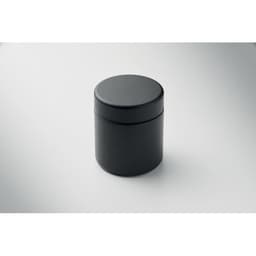 A black container with a smooth, rounded lid, placed on a light background. It features a simple and modern design.