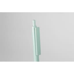 A green drink bottle with a clip and a smooth, minimalist design. It features a logo on the side.