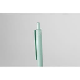 A mint green pen featuring a clip and a rounded top, alongside a simple logo.